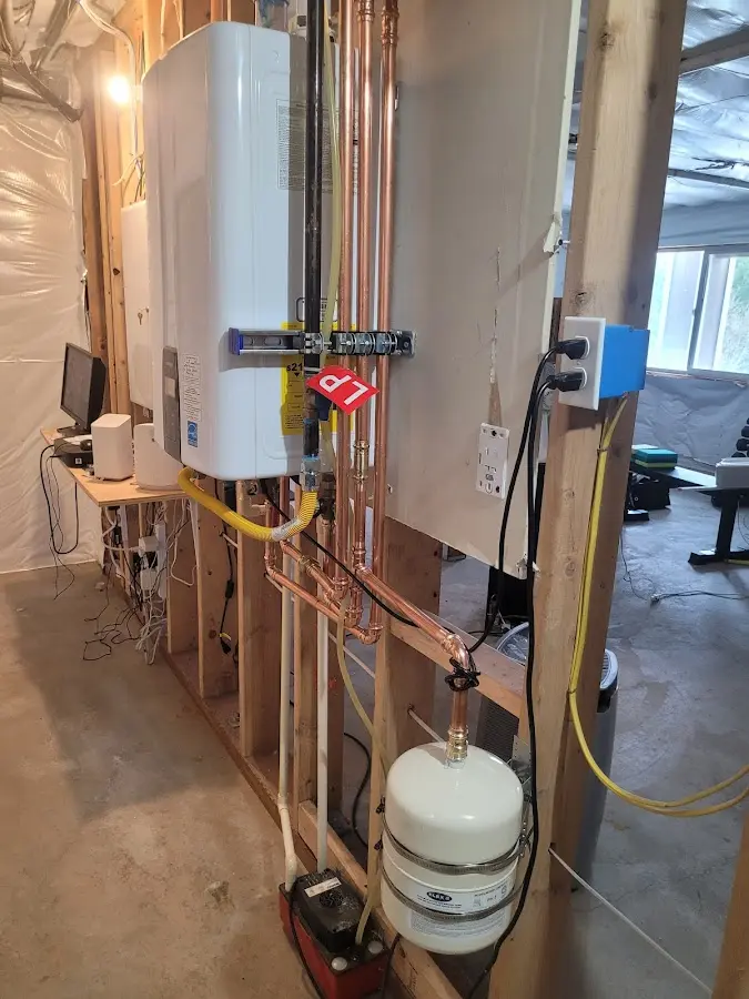 Licensed plumber repairing a kitchen sink in Bolivar Peninsula